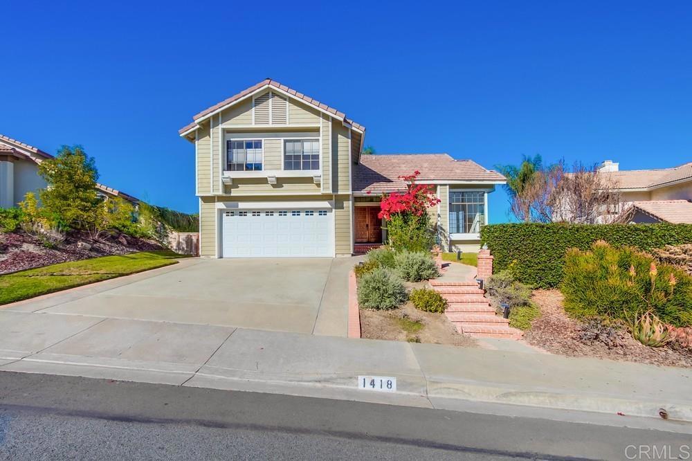 view of property featuring a garage