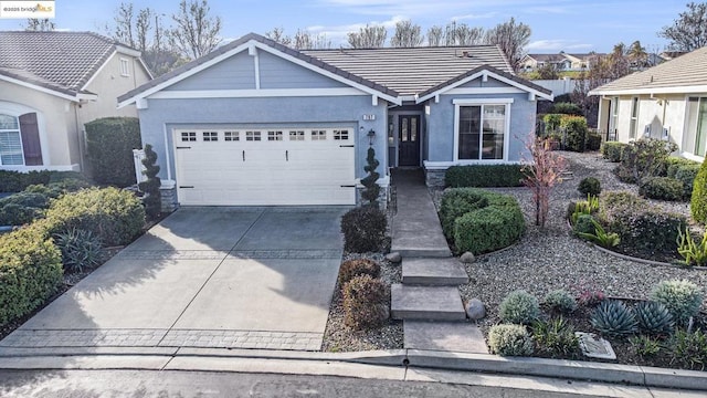 view of front of home with a garage