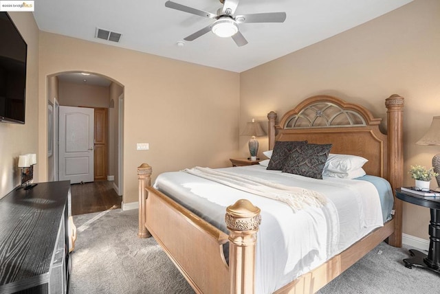 carpeted bedroom featuring ceiling fan