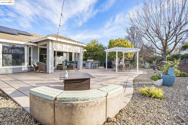 view of patio / terrace featuring exterior bar, a pergola, and an outdoor hangout area