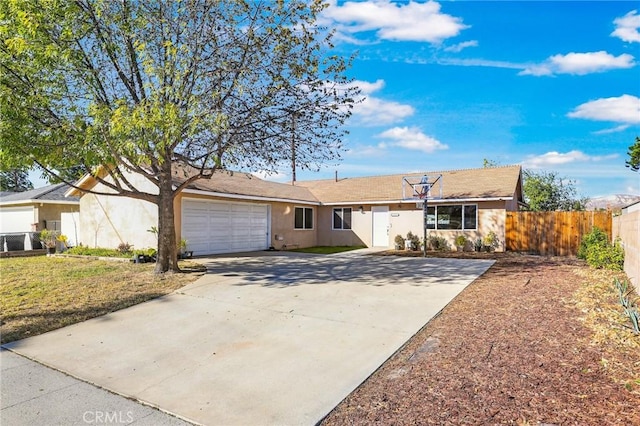 ranch-style house featuring a garage