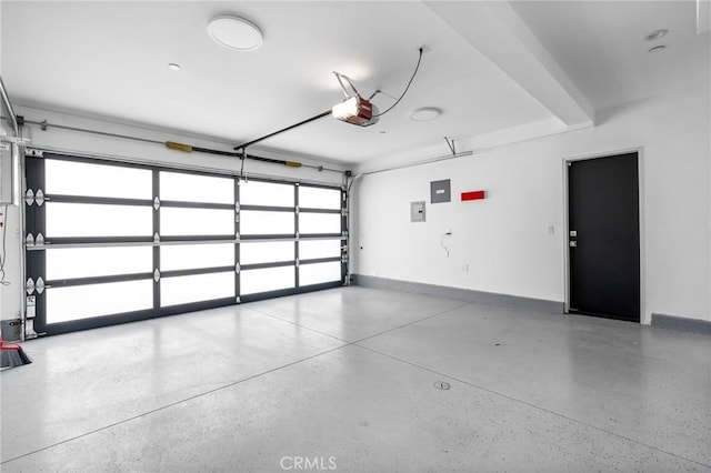 garage featuring a garage door opener and electric panel