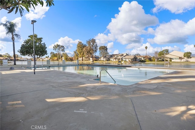 view of swimming pool featuring a patio