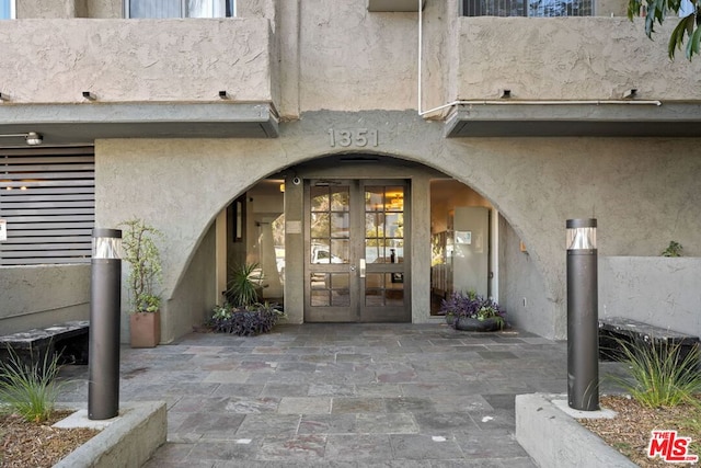 doorway to property with french doors