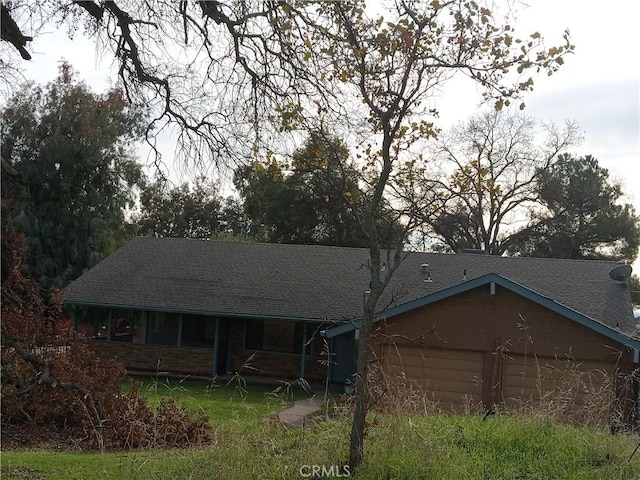 ranch-style home with a garage