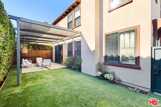 view of yard featuring an outdoor living space and a patio