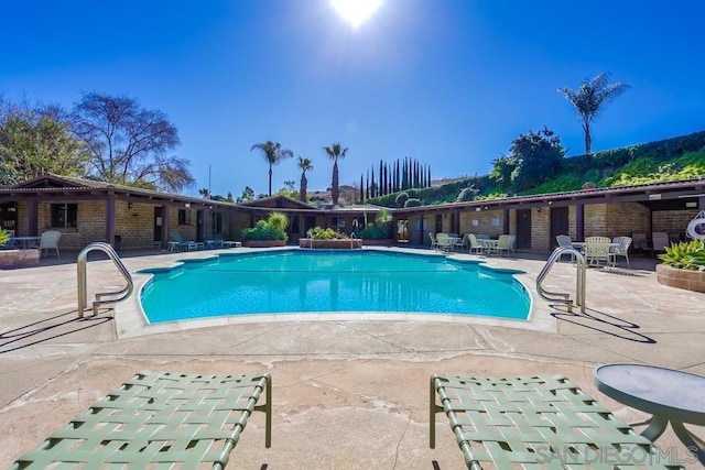 view of pool with a patio area