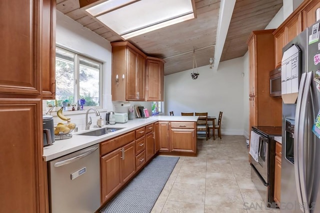 kitchen with kitchen peninsula, light tile patterned floors, wood ceiling, appliances with stainless steel finishes, and sink