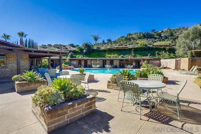 view of pool with a patio