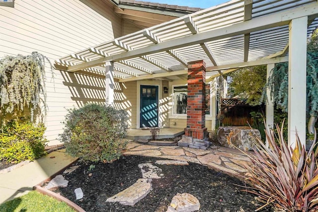 doorway to property featuring a pergola