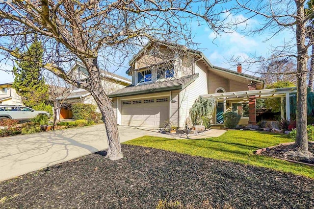 view of property featuring a front yard and a garage