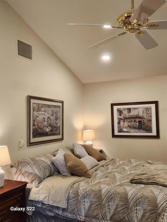 bedroom with lofted ceiling and ceiling fan