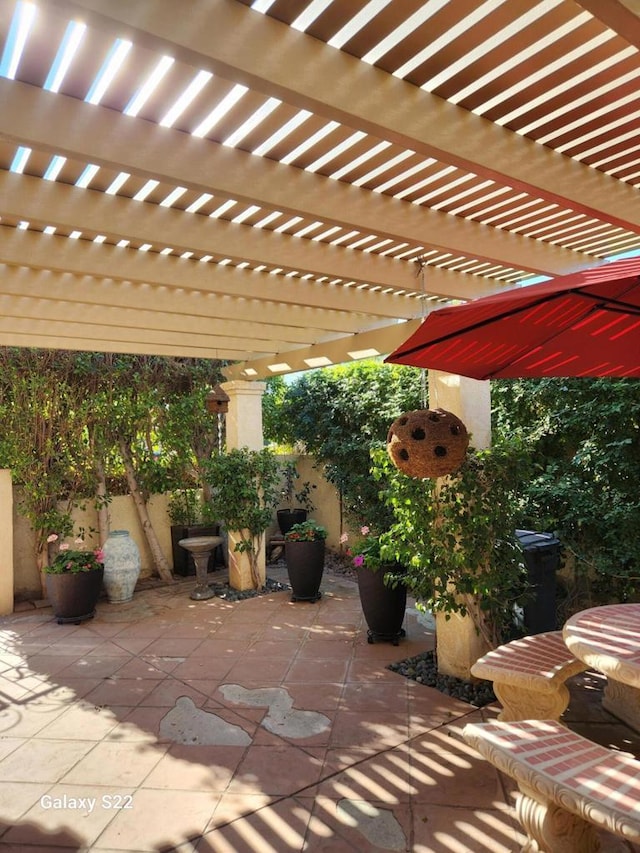 view of patio / terrace featuring a pergola