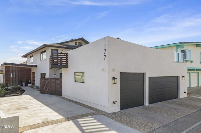 view of side of property with a garage