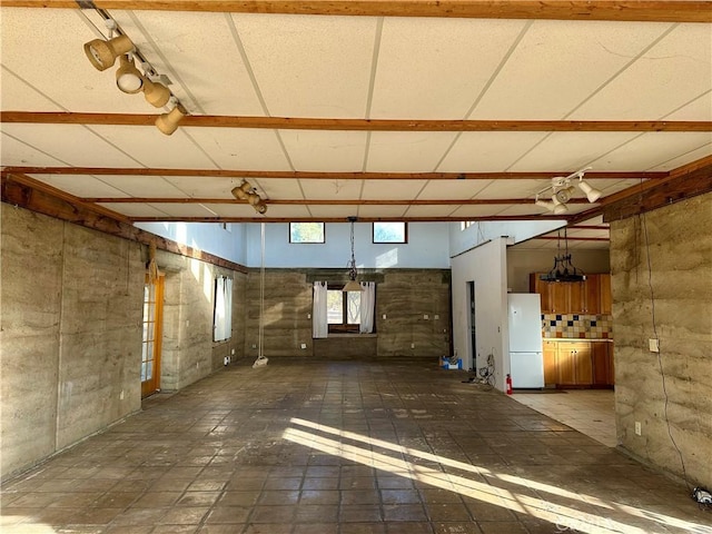 garage with white fridge