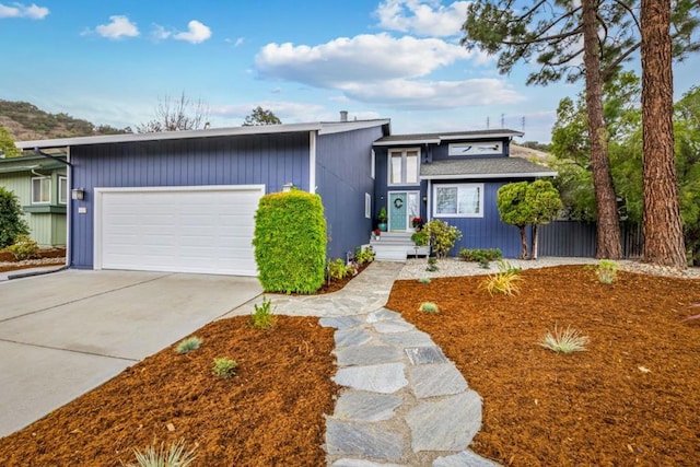 view of front of home with a garage