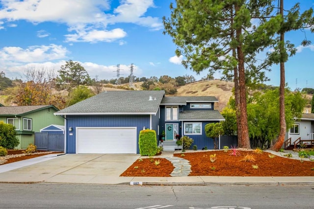 view of front of home with a garage