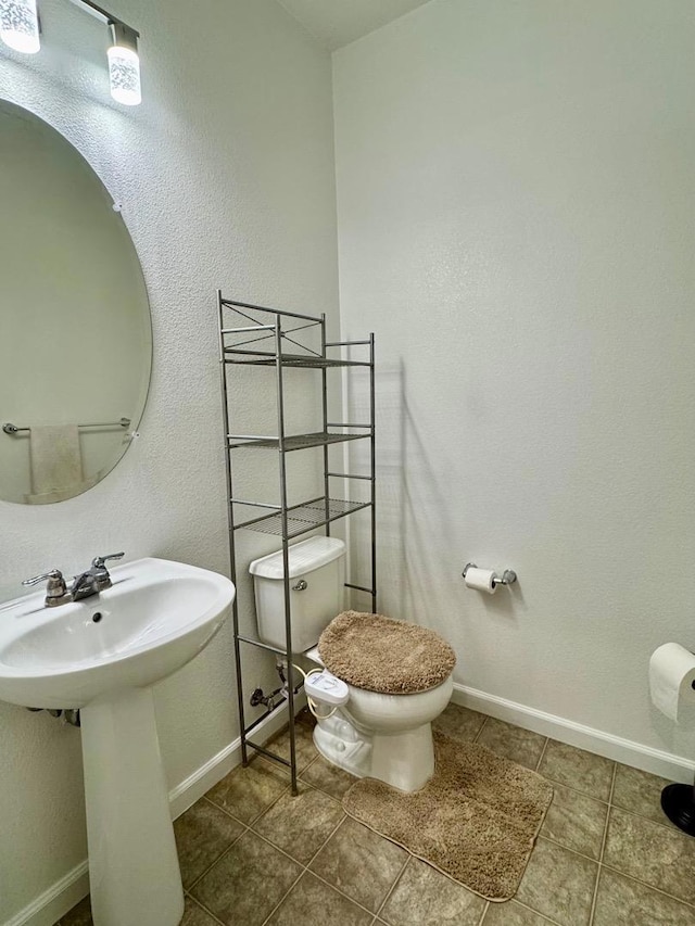 bathroom featuring toilet