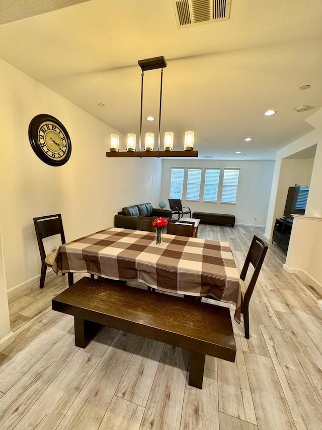 dining room with light hardwood / wood-style floors