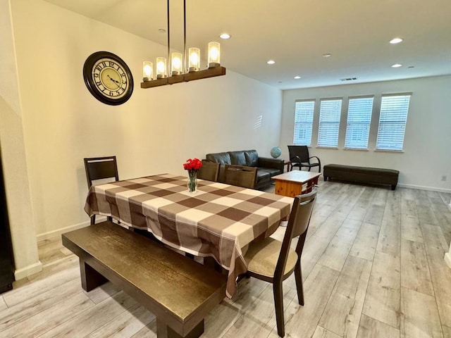 dining space featuring light hardwood / wood-style flooring