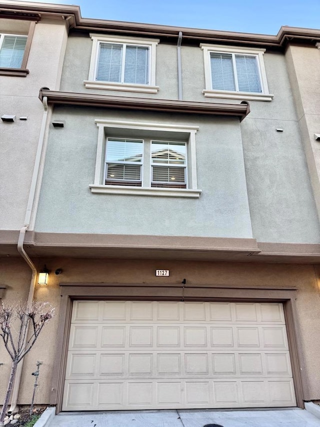 exterior space featuring a garage