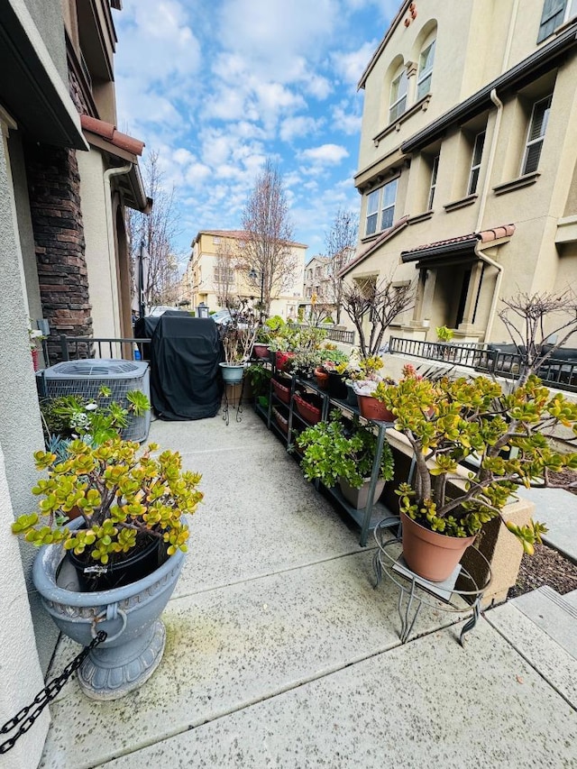 view of patio / terrace with central air condition unit