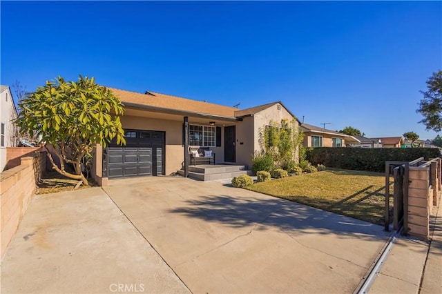 ranch-style home featuring a garage