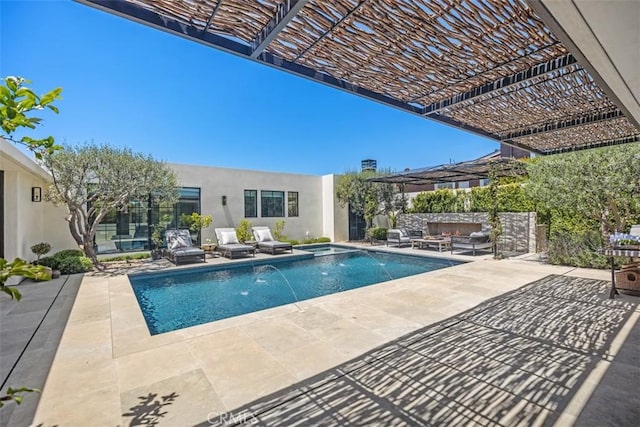 view of swimming pool featuring a pergola, pool water feature, a patio area, and outdoor lounge area