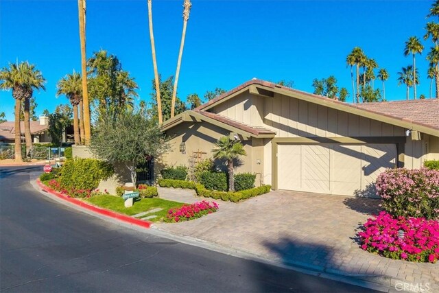 view of front of home featuring a garage