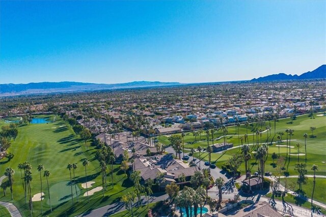 birds eye view of property featuring a mountain view