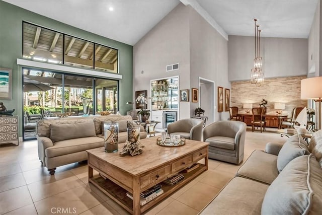 tiled living room with high vaulted ceiling