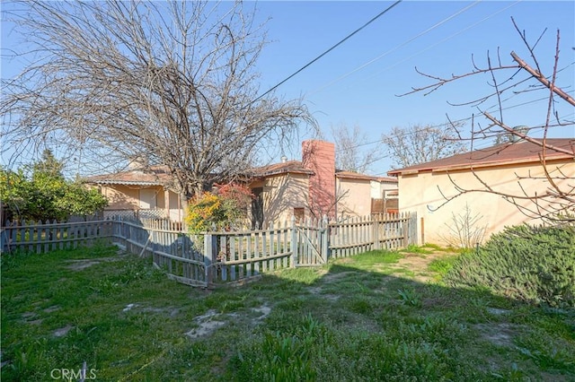 view of yard with fence