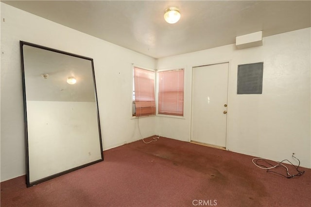 unfurnished room with carpet flooring