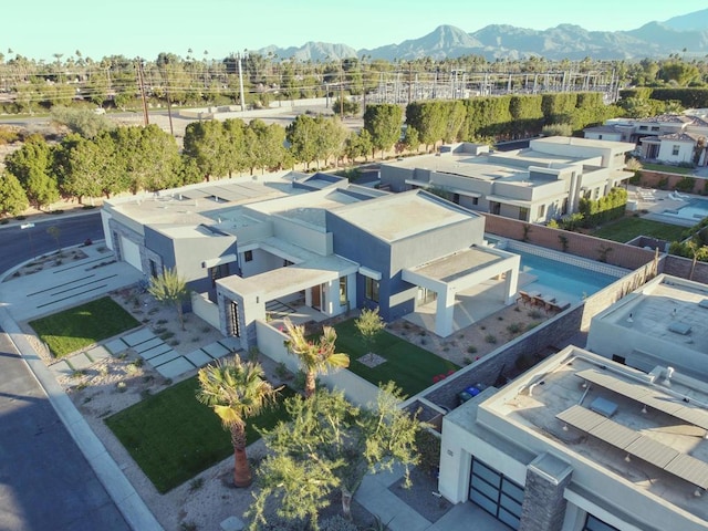 birds eye view of property featuring a mountain view