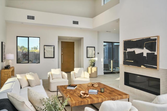 living room with a high ceiling