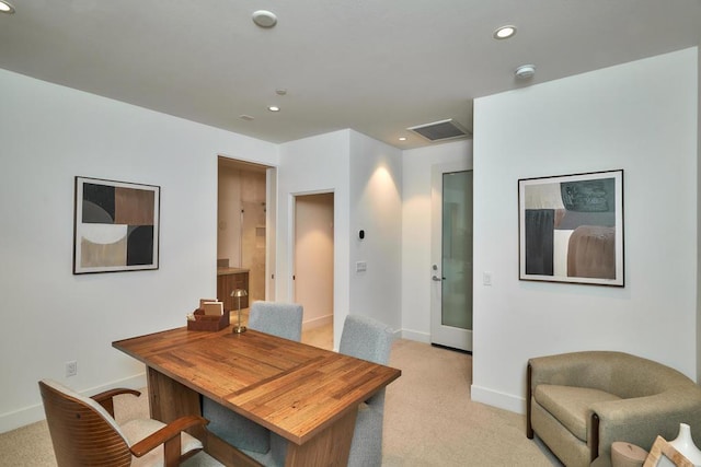 view of carpeted dining room