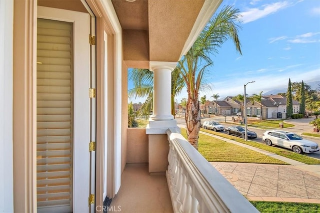 balcony featuring a residential view