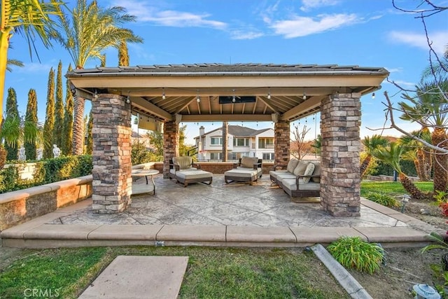 view of patio / terrace with a gazebo and outdoor lounge area