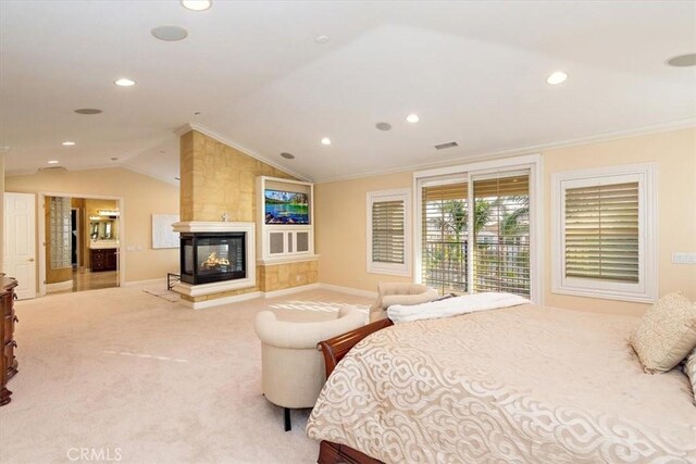 carpeted bedroom featuring visible vents, lofted ceiling, recessed lighting, a multi sided fireplace, and ornamental molding