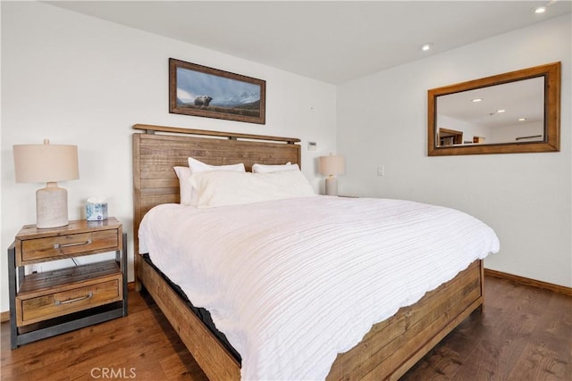 bedroom featuring dark wood-type flooring