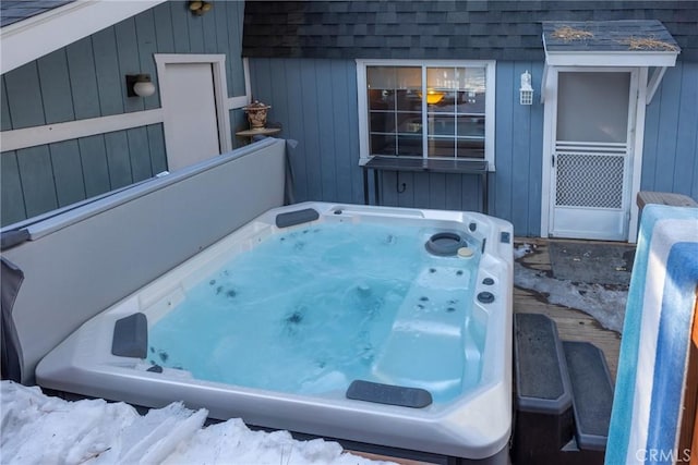 exterior space featuring a hot tub