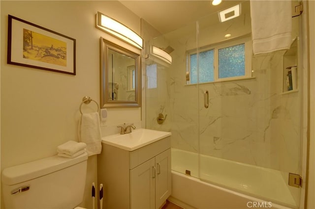 full bathroom with toilet, vanity, and combined bath / shower with glass door