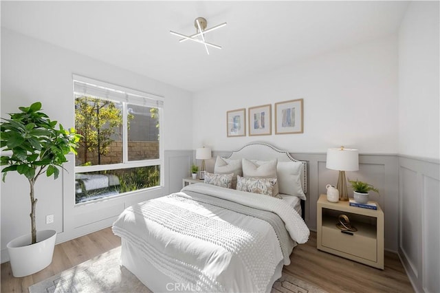 bedroom with light wood-type flooring