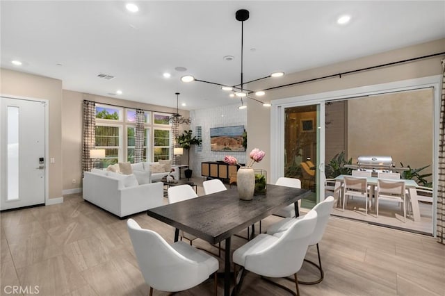 dining area featuring a chandelier