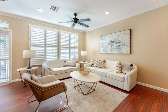 living room featuring ceiling fan, crown molding, and hardwood / wood-style floors