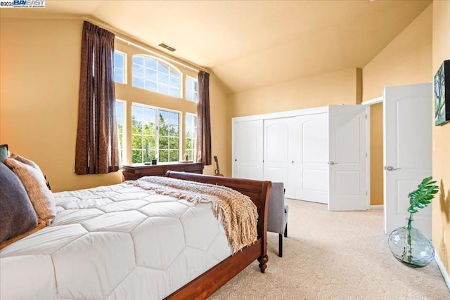 carpeted bedroom featuring lofted ceiling, a closet, and pool table