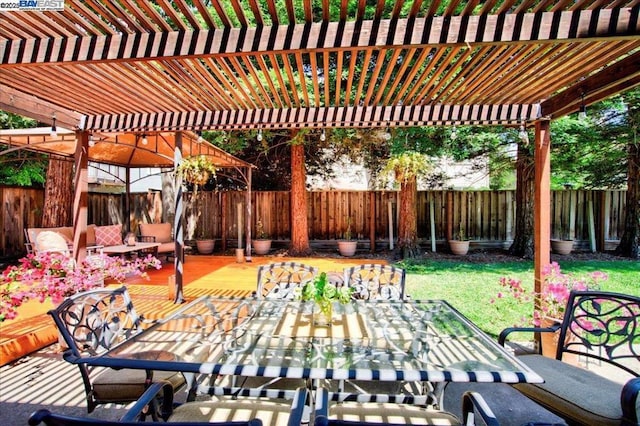 view of patio / terrace featuring a pergola and a deck