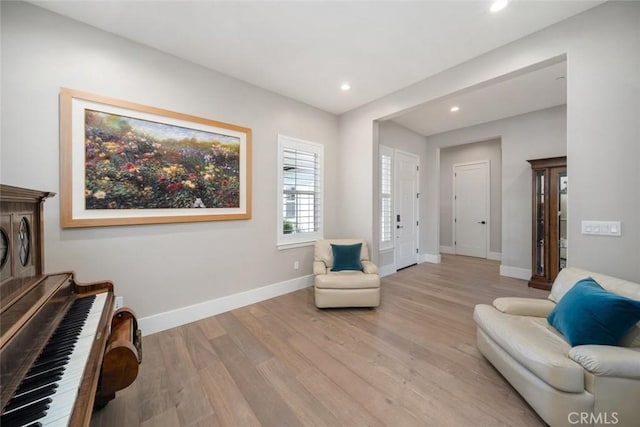 living area with light hardwood / wood-style floors