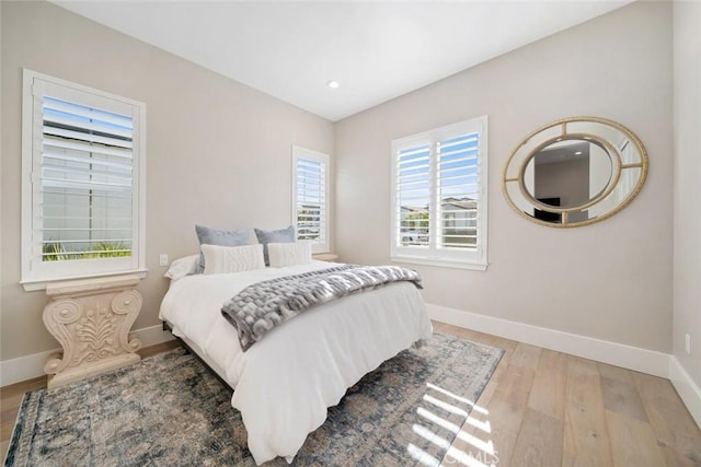 bedroom with wood-type flooring