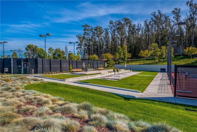 view of home's community featuring a lawn